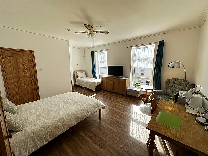 Bedroom with desk and chair